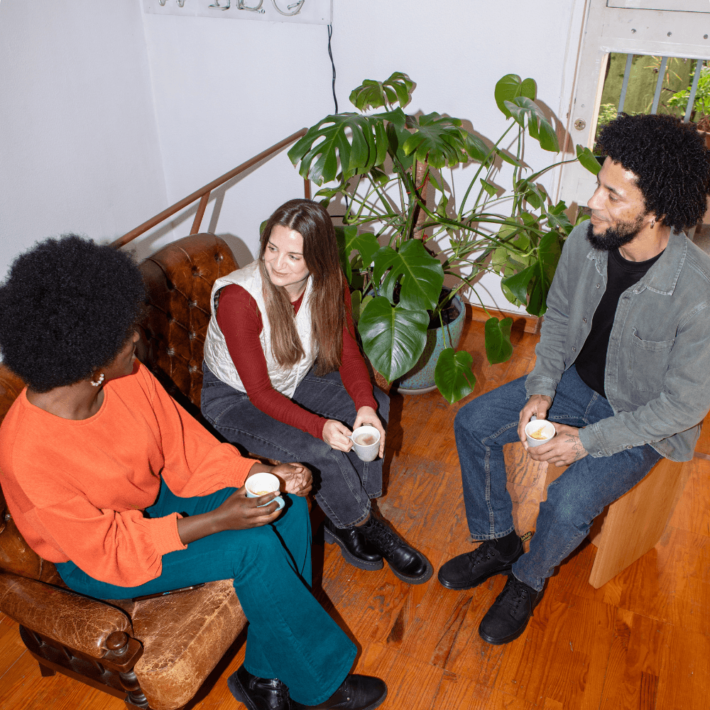 Two team members reviewing materials together during onboarding